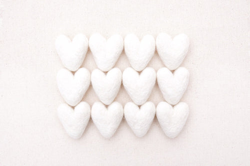 white felt hearts, needle felted hearts