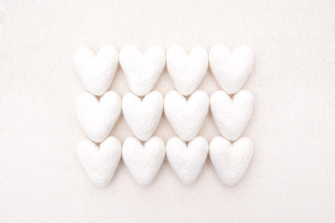 white felt hearts, needle felted hearts