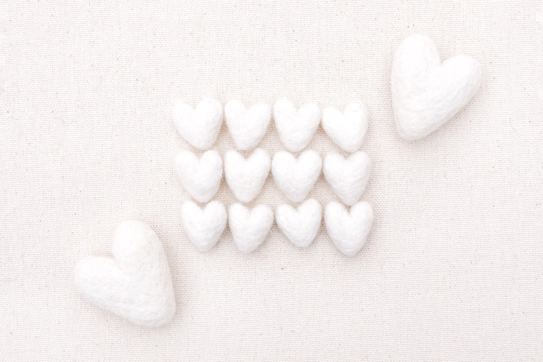 tiny white felt hearts