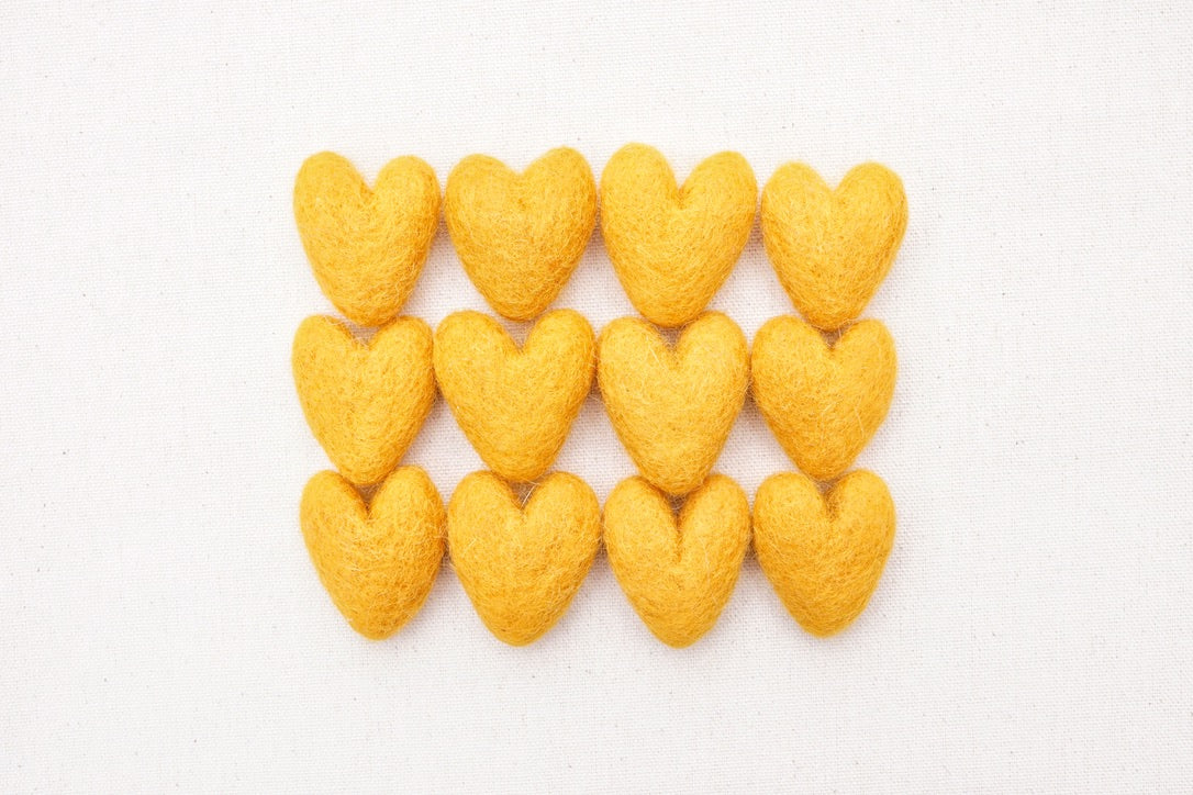 marigold felt hearts, needle felted hearts