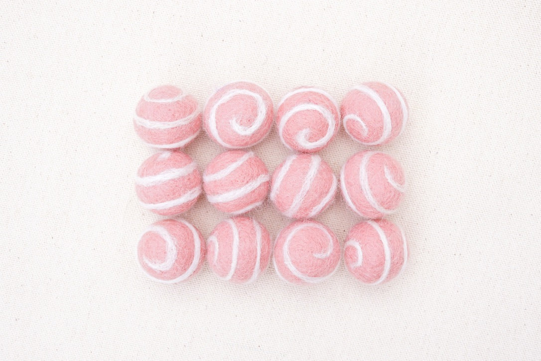 swirl felt balls pink with white swirl