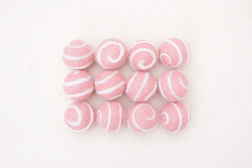 swirl felt balls pink with white swirl