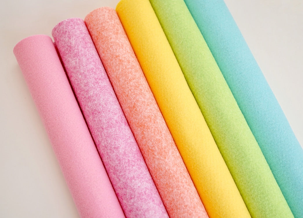 wool blend felt Colours from left to right: Cotton Candy, Pixie Pink, Charming Coral, Eternal Sunshine, Chartreuse, Alluring Aqua