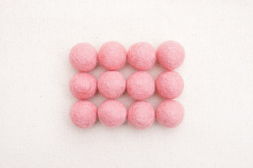 dusty pink felt balls