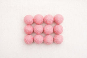dusty pink felt balls