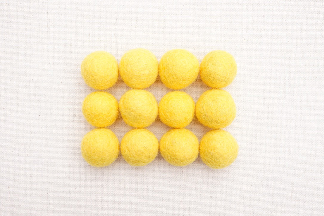 canary felt balls