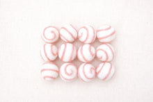 Load image into Gallery viewer, swirl felt balls white with pink swirl