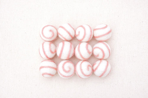 swirl felt balls white with pink swirl