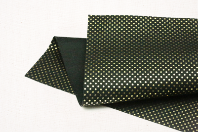 metallic gold dots on black felt