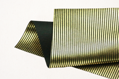 metallic gold stripes on black felt