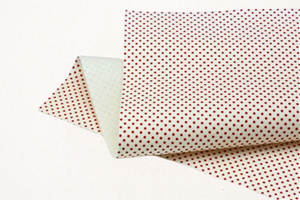 red dots on white felt